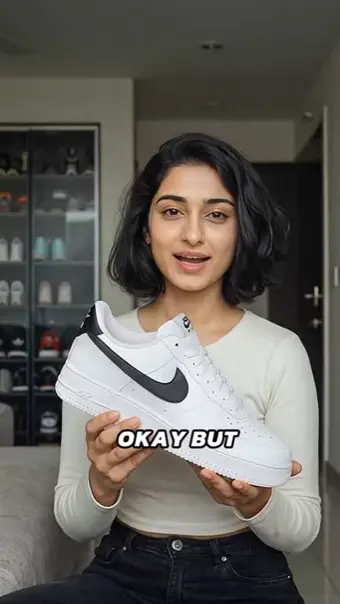 Avatar holding a white sneaker